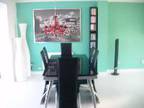 Dining table and 6 chairs black tempered glass dining....